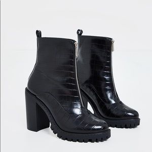 Heeled front zip combat boots